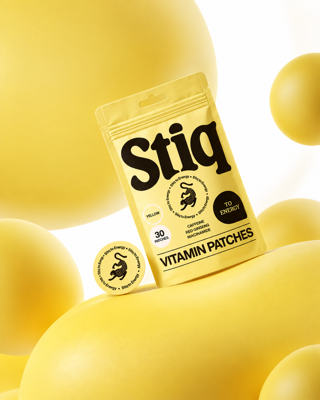 Envase de parches de vitaminas para la energía Stiq Patches junto a un parche vitamínico Energy.